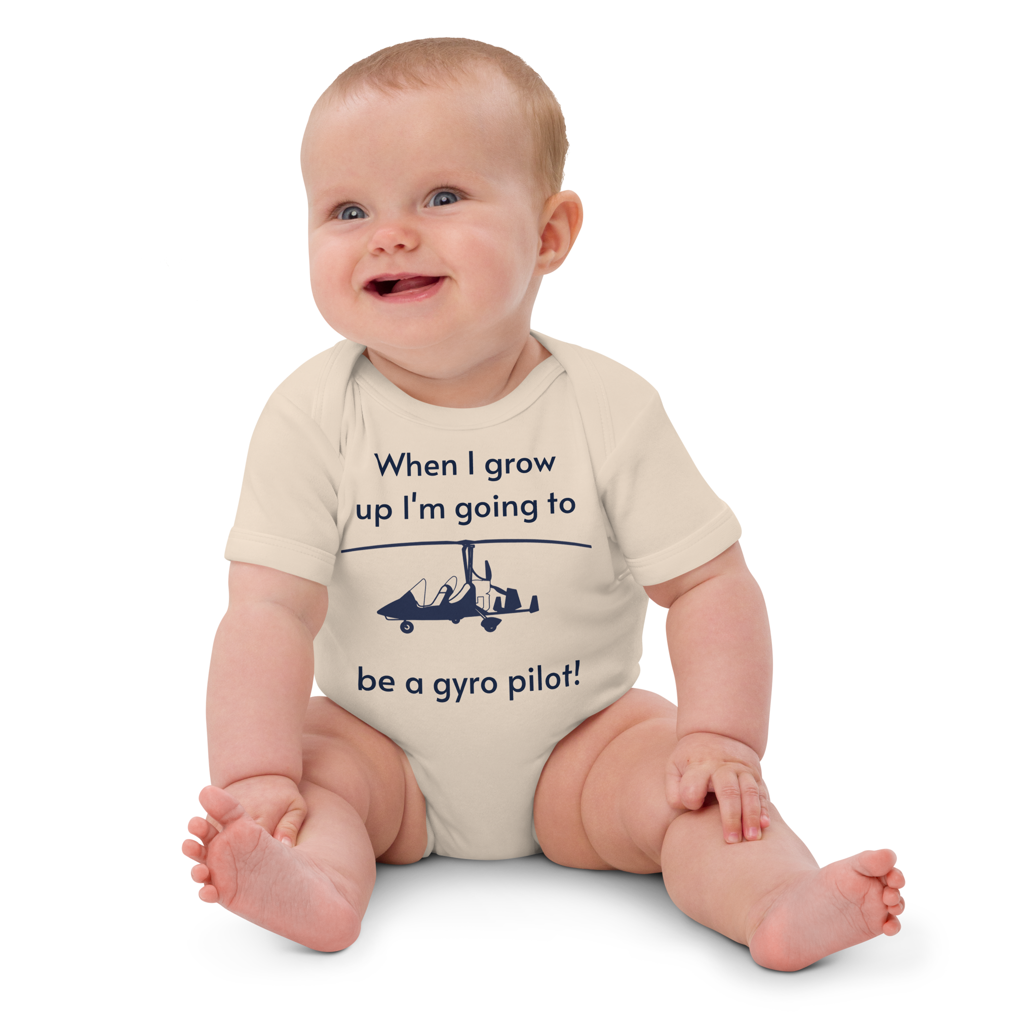 Baby Pilots wear: Organic cotton baby's bodysuit with an image of a navy blue weight shift aircraft surrounded by a sentence that says "when I grow up i'm going to be a gyro pilot!"