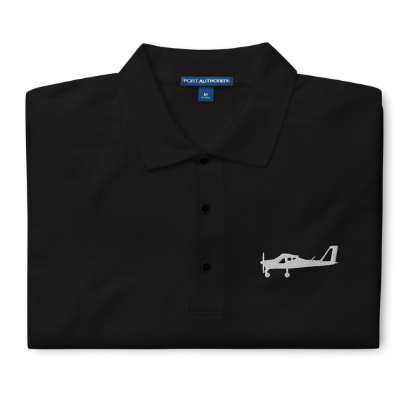 White Tecnam P92 aircraft embroidered design placed on the left breast of a black polo shirt