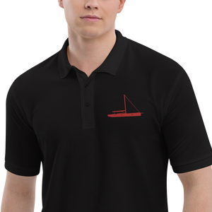 Sailing apparel: Black polo shirt depicting a red sailing boat placed over the left breast.