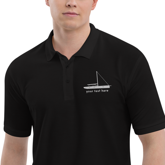 Sailing apparel: Black polo shirt with a white sloop rigged sailing boat placed over the left breast.