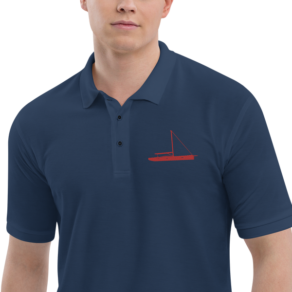 Sailing apparel: Navy blue polo shirt depicting a red sailing boat placed over the left breast.