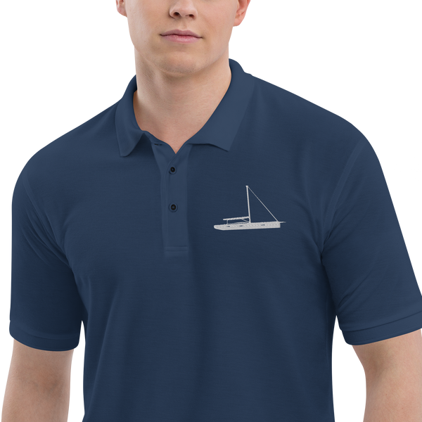 Sailing apparel: Navy blue polo shirt depicting a white embroidered sailing boat placed over the left breast.