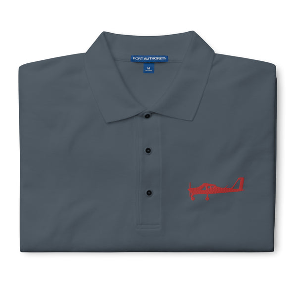 Red Tecnam P92 aircraft embroidered design placed on the left breast of a grey colour polo shirt.