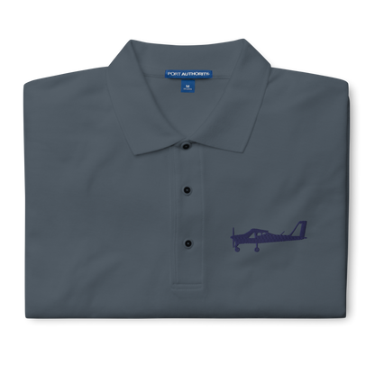 Navy blue Tecnam P92 aircraft embroidered design placed on the left breast of a dark grey polo shirt.