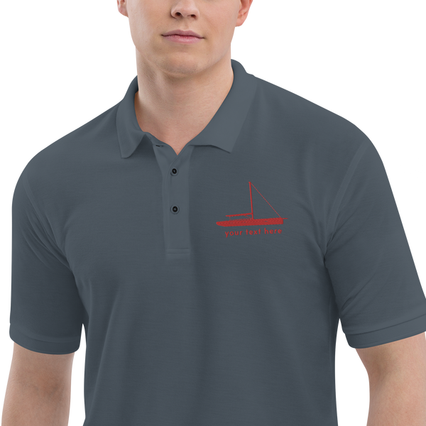 Sailing apparel: Asphalt grey polo shirt with a red sloop rigged sailing boat placed over the left breast.