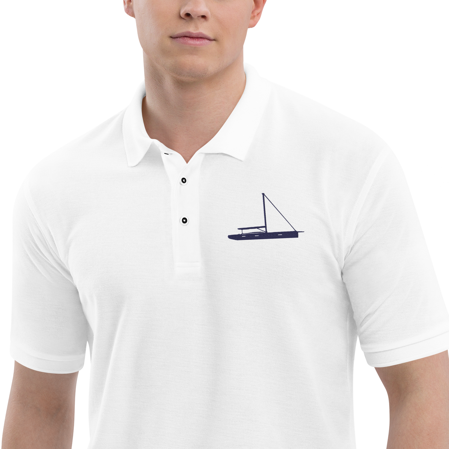 Sailing apparel: White polo shirt with a navy blue sloop rigged sailing boat.