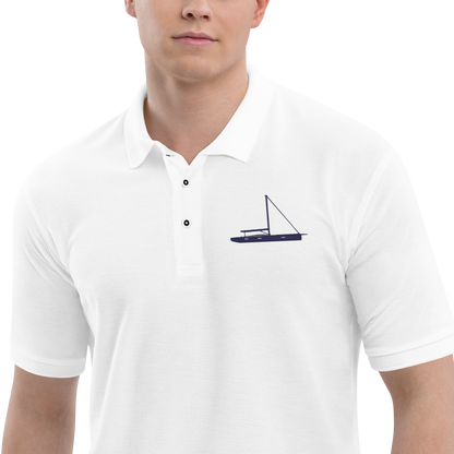 Sailing apparel: White polo shirt with a navy blue sloop rigged sailing boat.