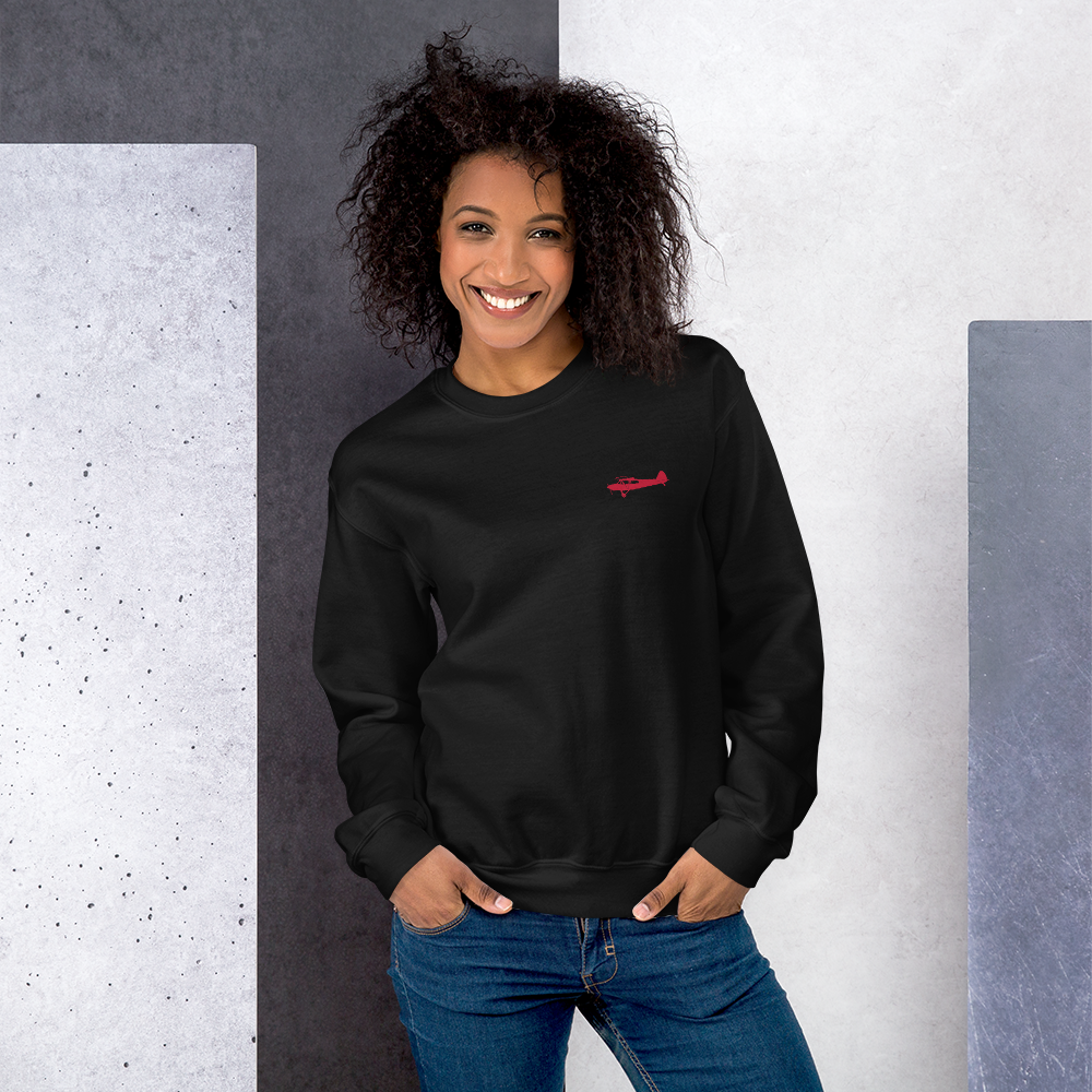 Pilots sweaters: Red Super Cub design positioned on the left breast of a black sweatshirt.