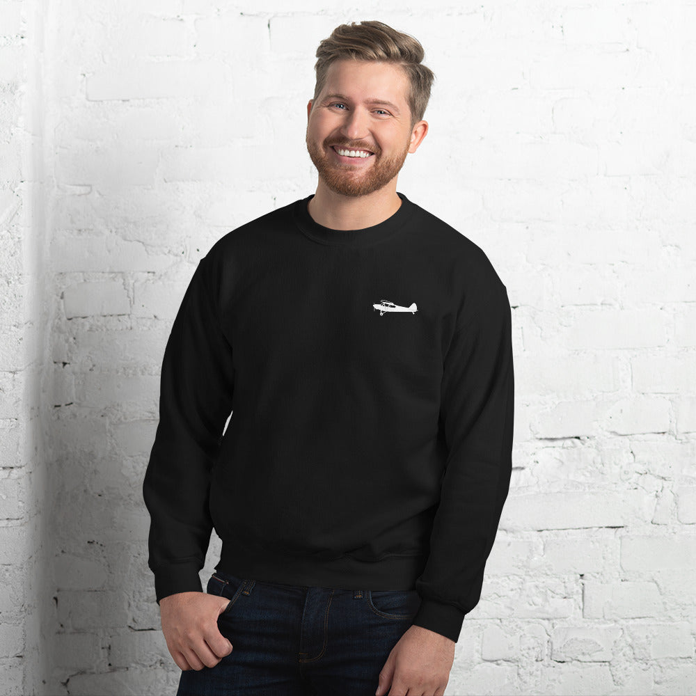 Pilots sweaters: White Super Cub design positioned on the left breast of a black sweatshirt.