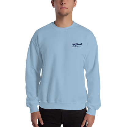 Navy blue Astore aircraft customizable design placed on the left breast of a  light blue sweatshirt