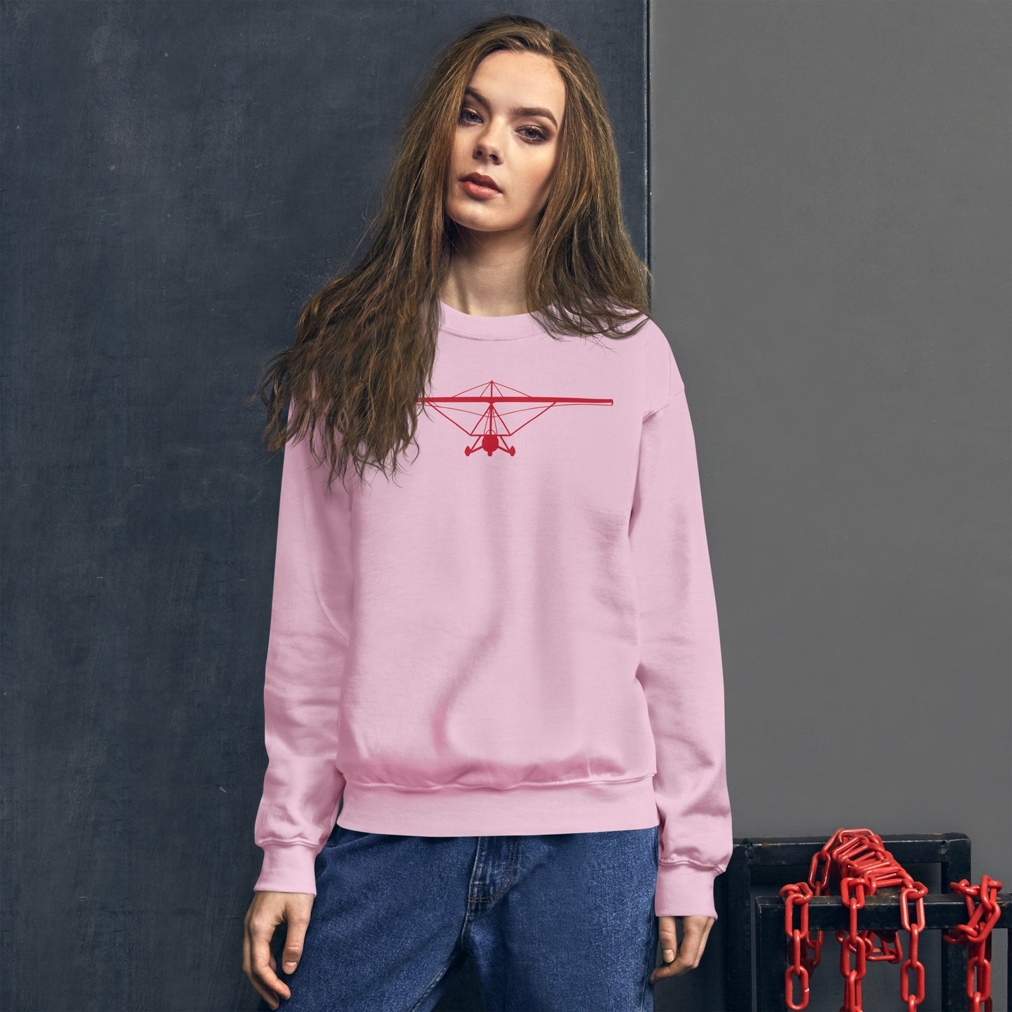 Pilot Shirts: Red large printed weight shift aircraft design placed on the front of a pink sweatshirt.