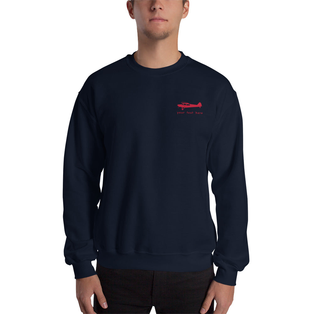 Pilots sweaters: Red Super Cub customizable design positioned on the left breast of a navy blue sweatshirt.