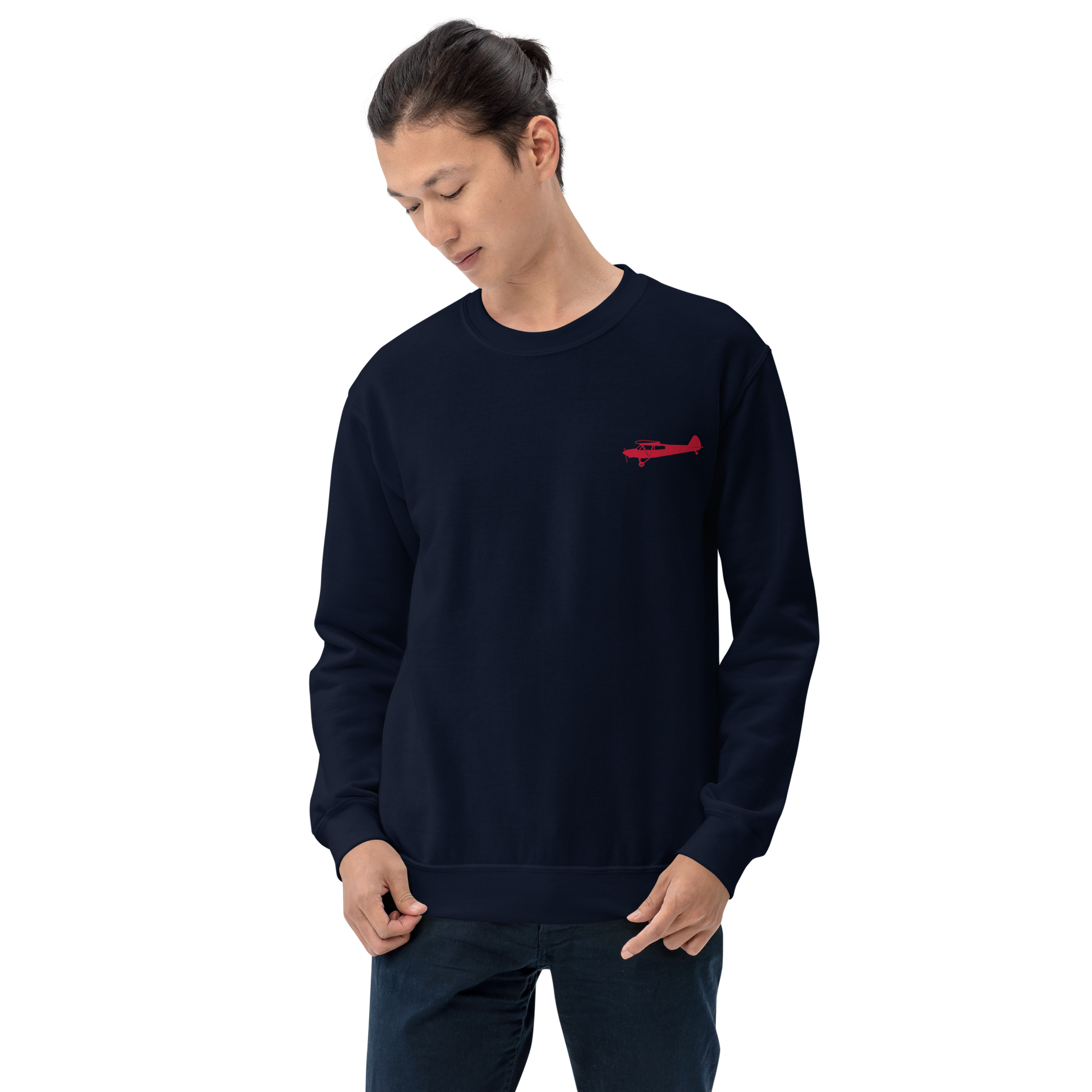 Pilots sweaters: Red Super Cub design positioned on the left breast of a navy blue sweatshirt.