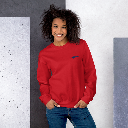 Pilots sweaters: navy blue Super Cub design positioned on the left breast of a red sweatshirt.