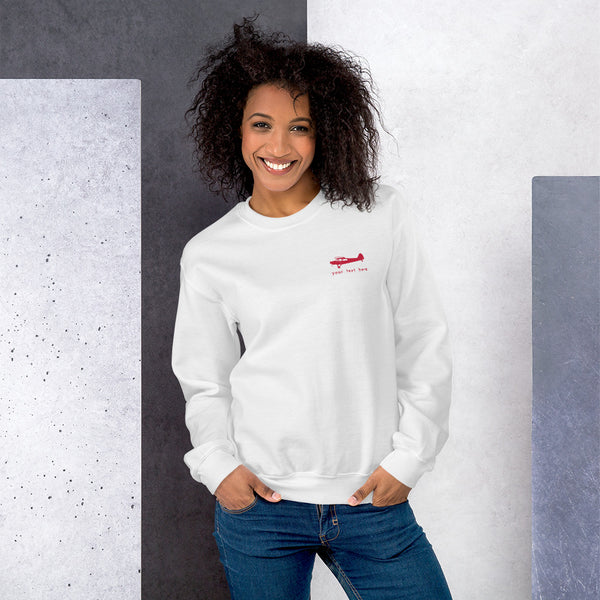 Pilots sweaters: Red Super Cub customizable design positioned on the left breast of a white sweatshirt.