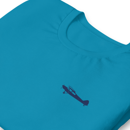 Pilots shirts: Navy blue Super Cub design positioned on the left breast of an aqua  t-shirt.