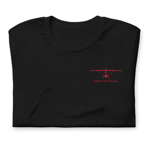 Pilot Shirts: Red customizable weight shift aircraft design placed on the left breast of a black t-shirt.