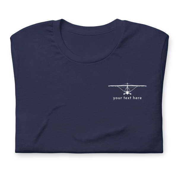 Pilot Shirts: White customizable weight shift aircraft design placed on the left breast of a navy blue t-shirt.