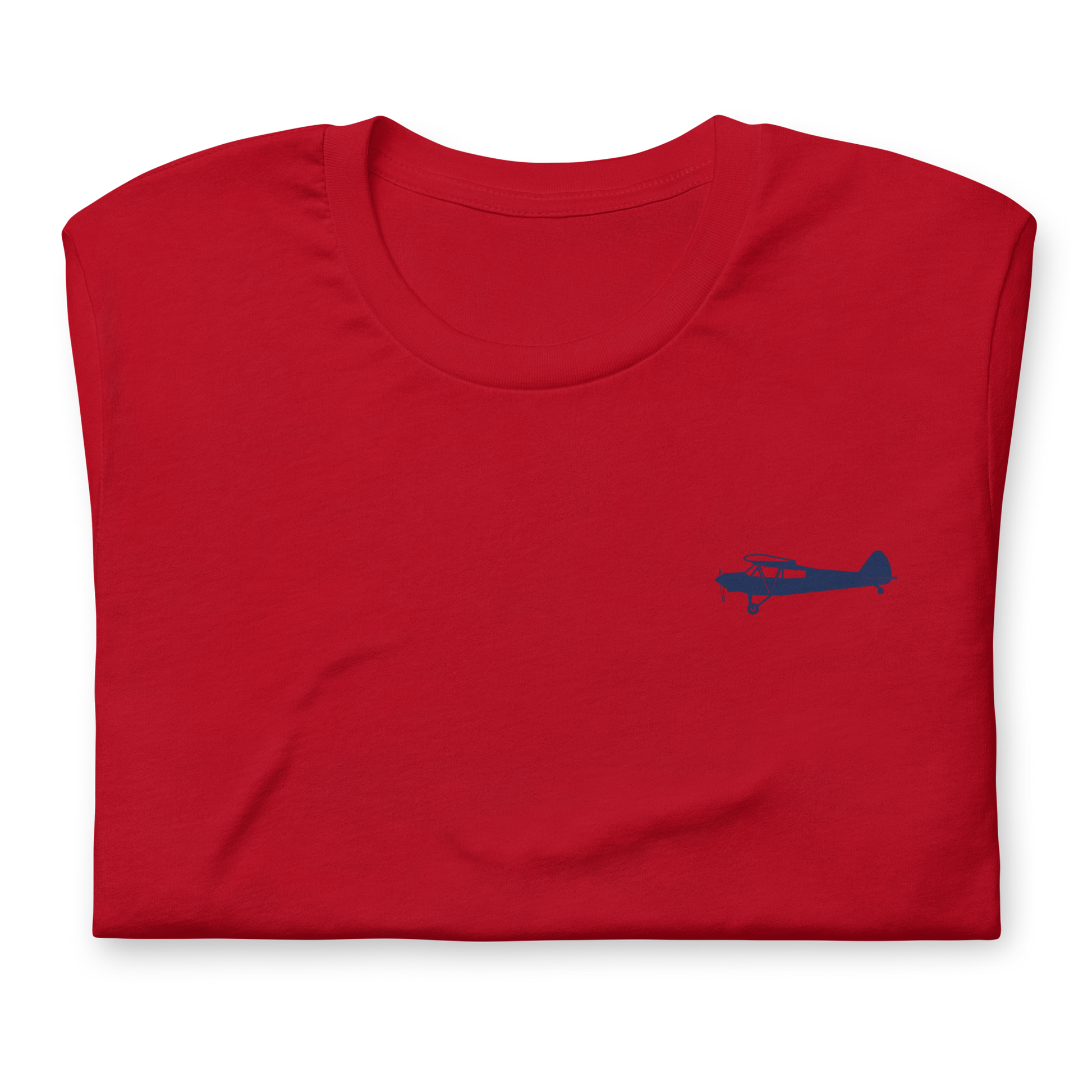 Pilots shirts: Navy blue Super Cub design positioned on the left breast of a red t-shirt.