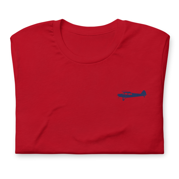 Pilots shirts: Navy blue Super Cub design positioned on the left breast of a red t-shirt.