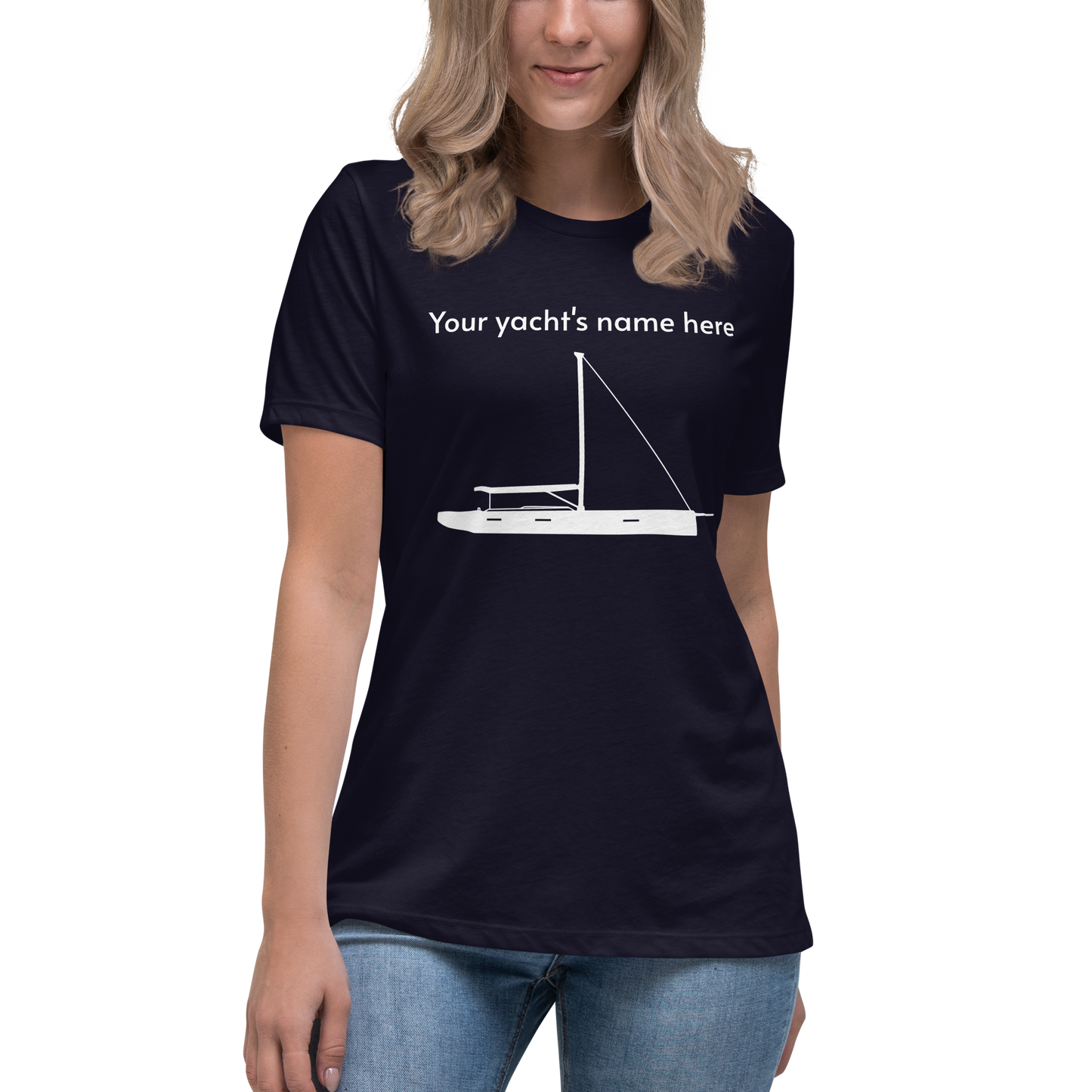 Sailing apparel: womens customizable navy blue Tee shirt depicting a white 80FT sailing boat with text above the mast saying "your yacht's name here" for customers to change at will.