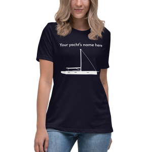 Sailing apparel: womens customizable navy blue Tee shirt depicting a white 80FT sailing boat with text above the mast saying "your yacht's name here" for customers to change at will.