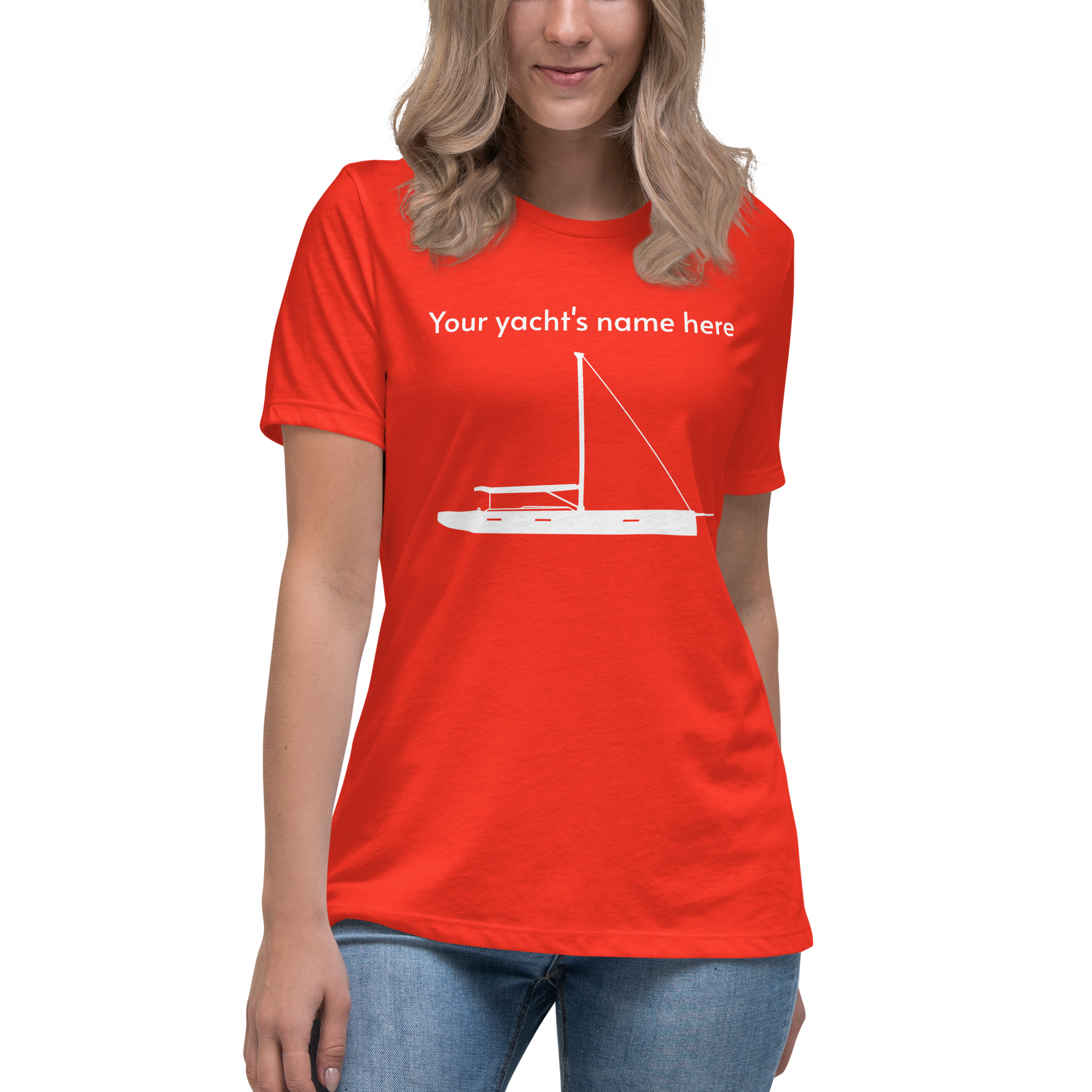 Sailing apparel: womens customizable poppy coloured Tee shirt depicting a white 80FT sailing boat with text above the mast saying "your yacht's name here" that customers may change at will.