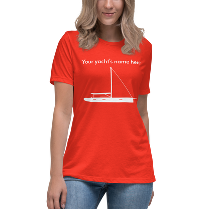 Sailing apparel: womens customizable poppy coloured Tee shirt depicting a white 80FT sailing boat with text above the mast saying "your yacht's name here" that customers may change at will.