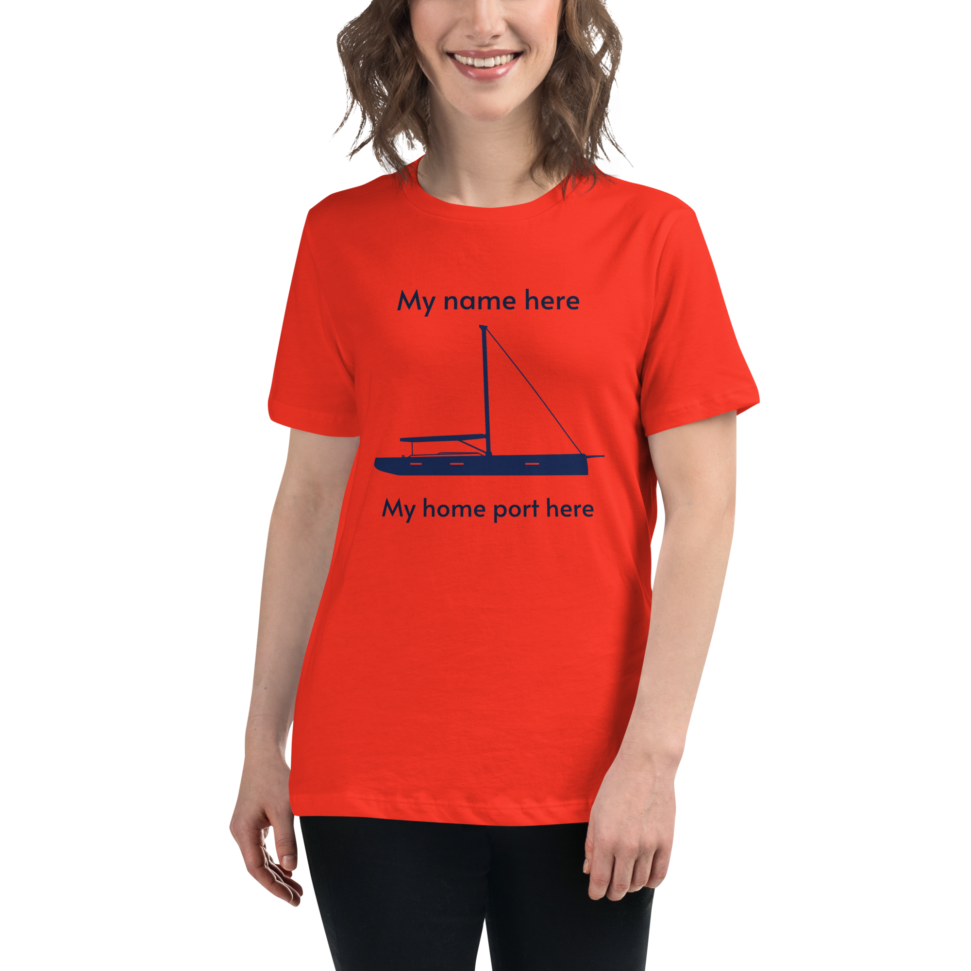 Sailing apparel: womens customizable poppy coloured Tee shirt depicting a navy blue 80FT sailing boat with text above the mast stating "My name here," and below the hull "my home port here" for customers to change at will.